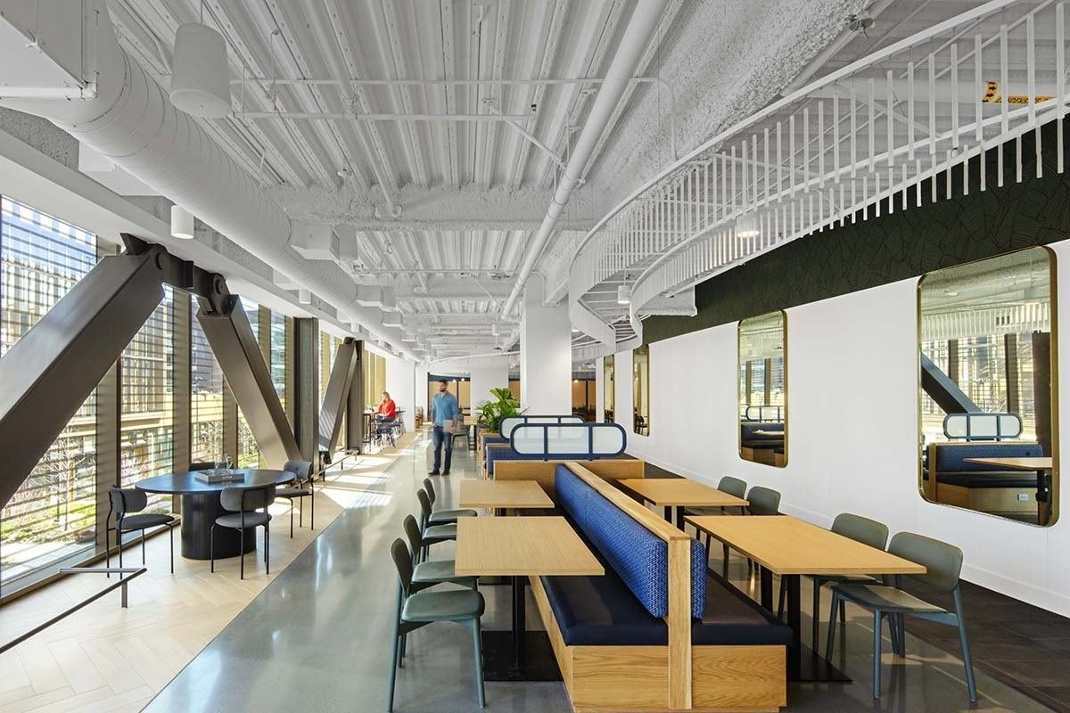 Uber: A café with banquettes along glass walls