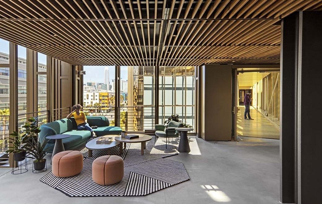 Uber: A lounge with wood ceiling slats and floor-to-ceiling glass