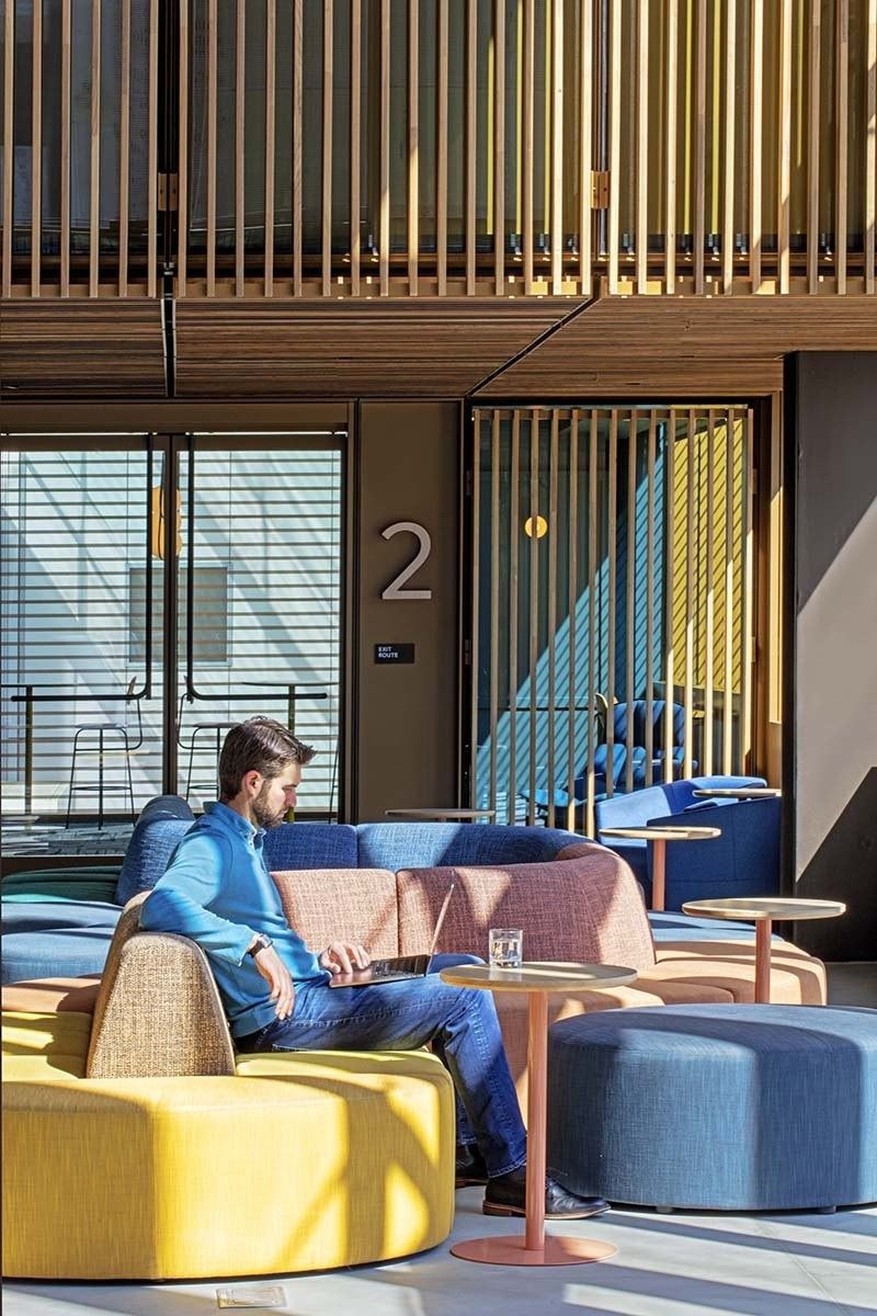 Uber: A lounge with yellow and blue seating