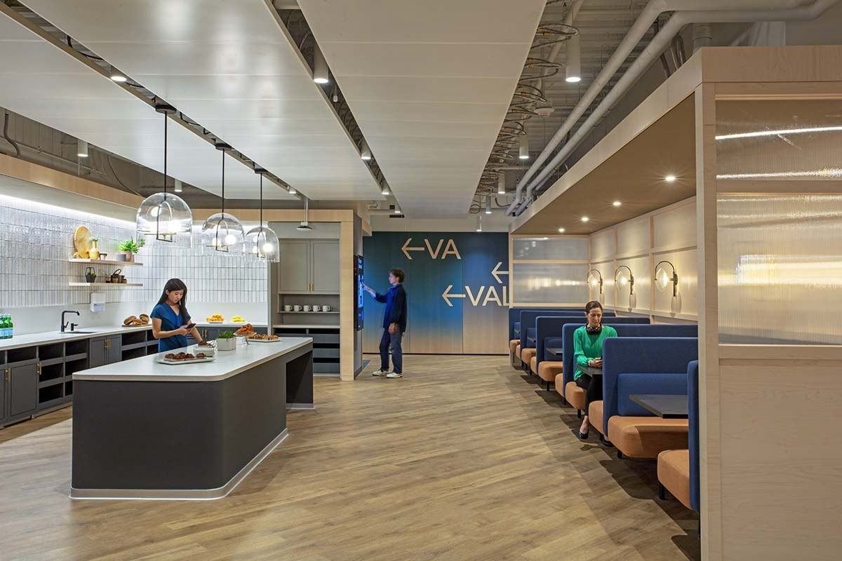 Uber: A team kitchen with blue booths