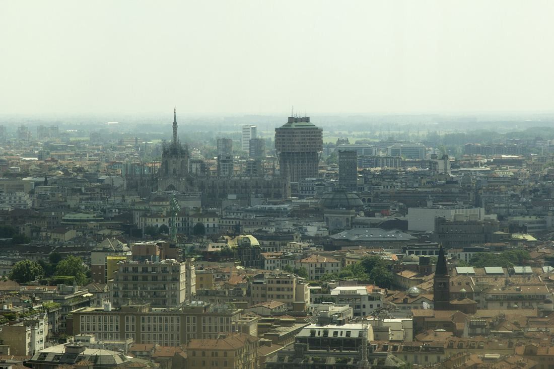UniCredit: Hazy wide view over Milan rooftops with the cathedral in the distance