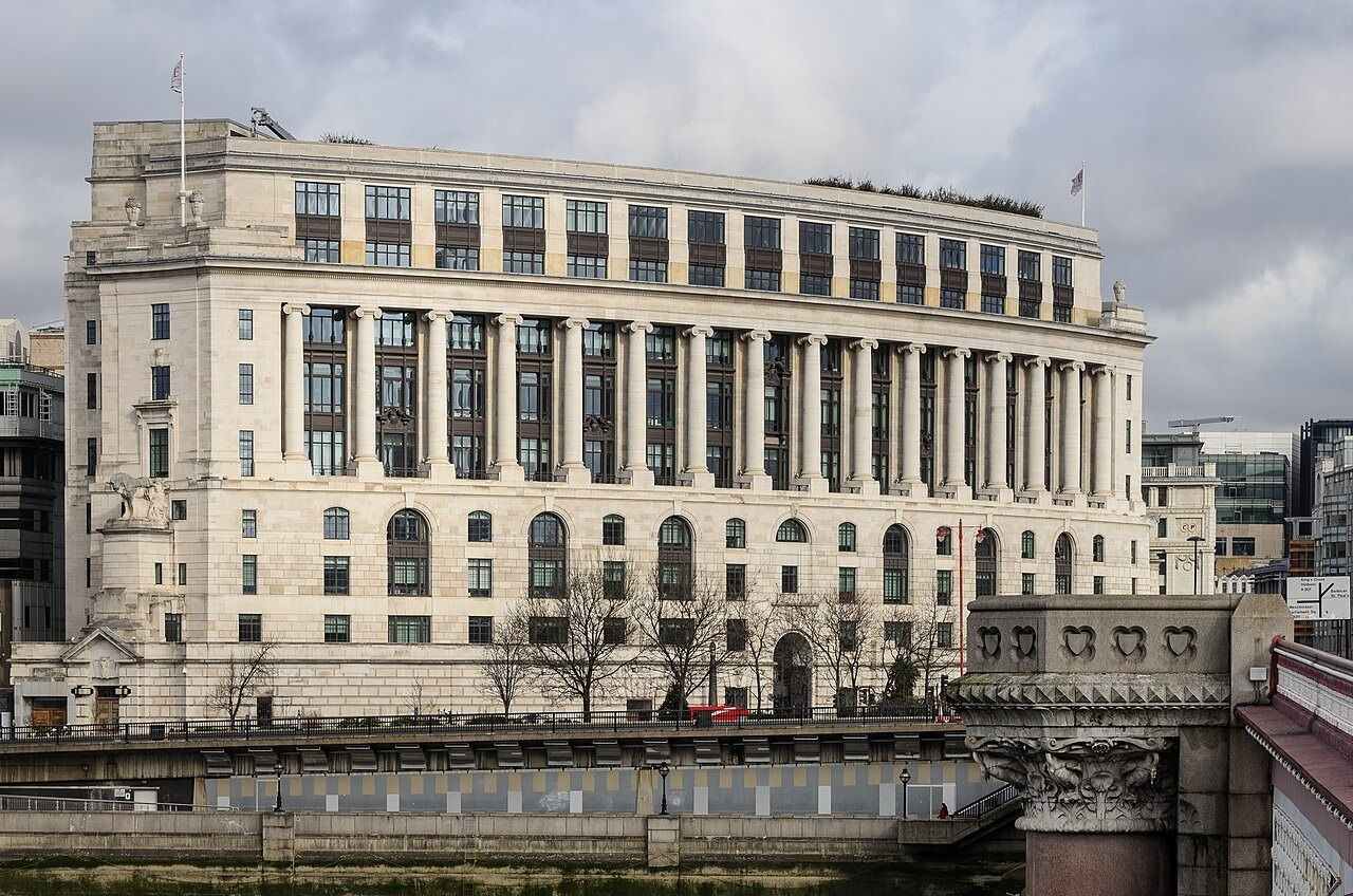 Curved stone façade of Unilever House by the Thames