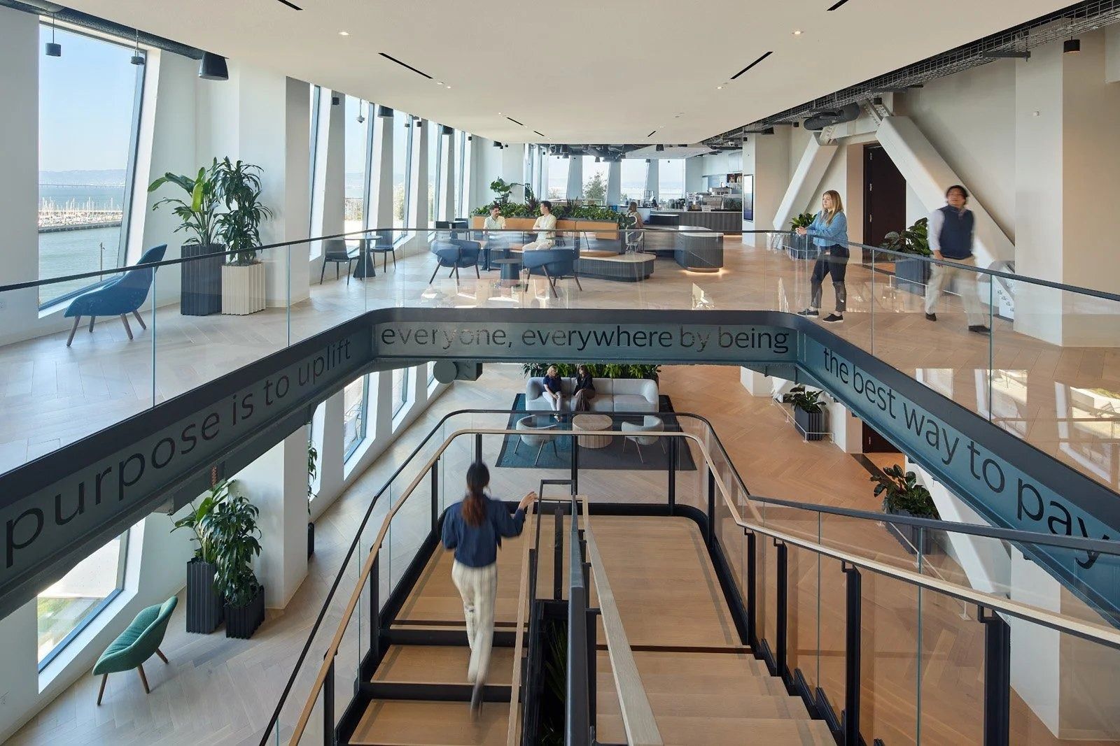 Visa: A walkway over an open atrium between floors