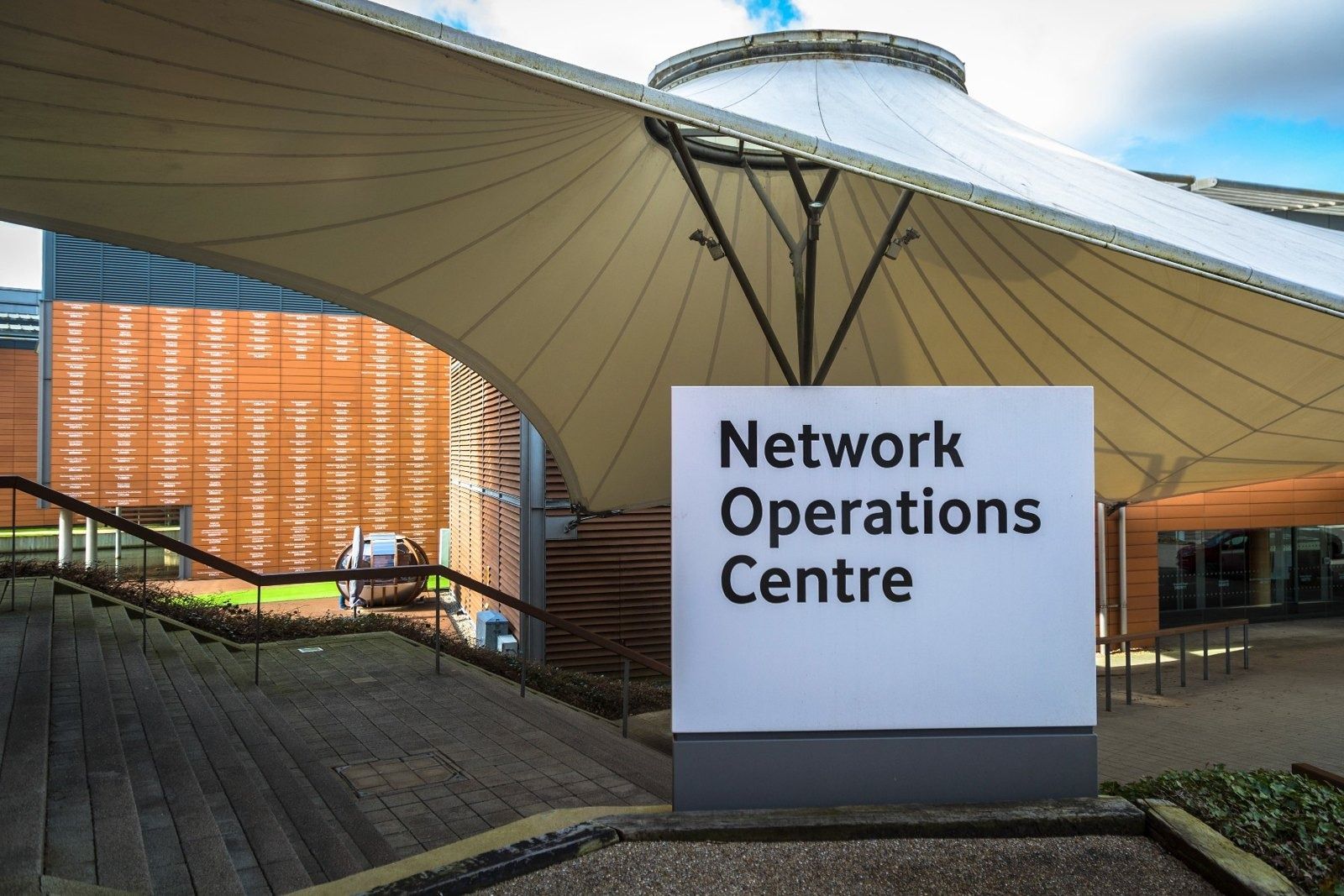 Vodafone: Fabric canopy over a walkway beside a sign reading Network Operations Centre