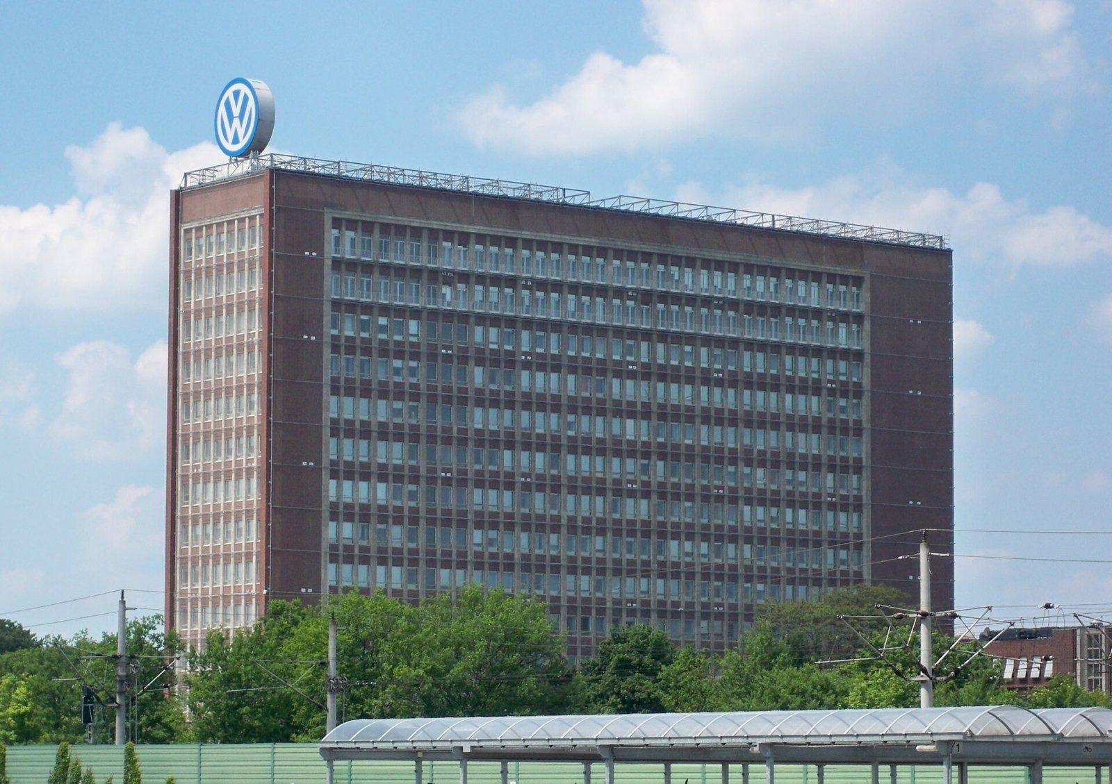 Volkswagen Group: Brick high-rise with the VW logo on the roof