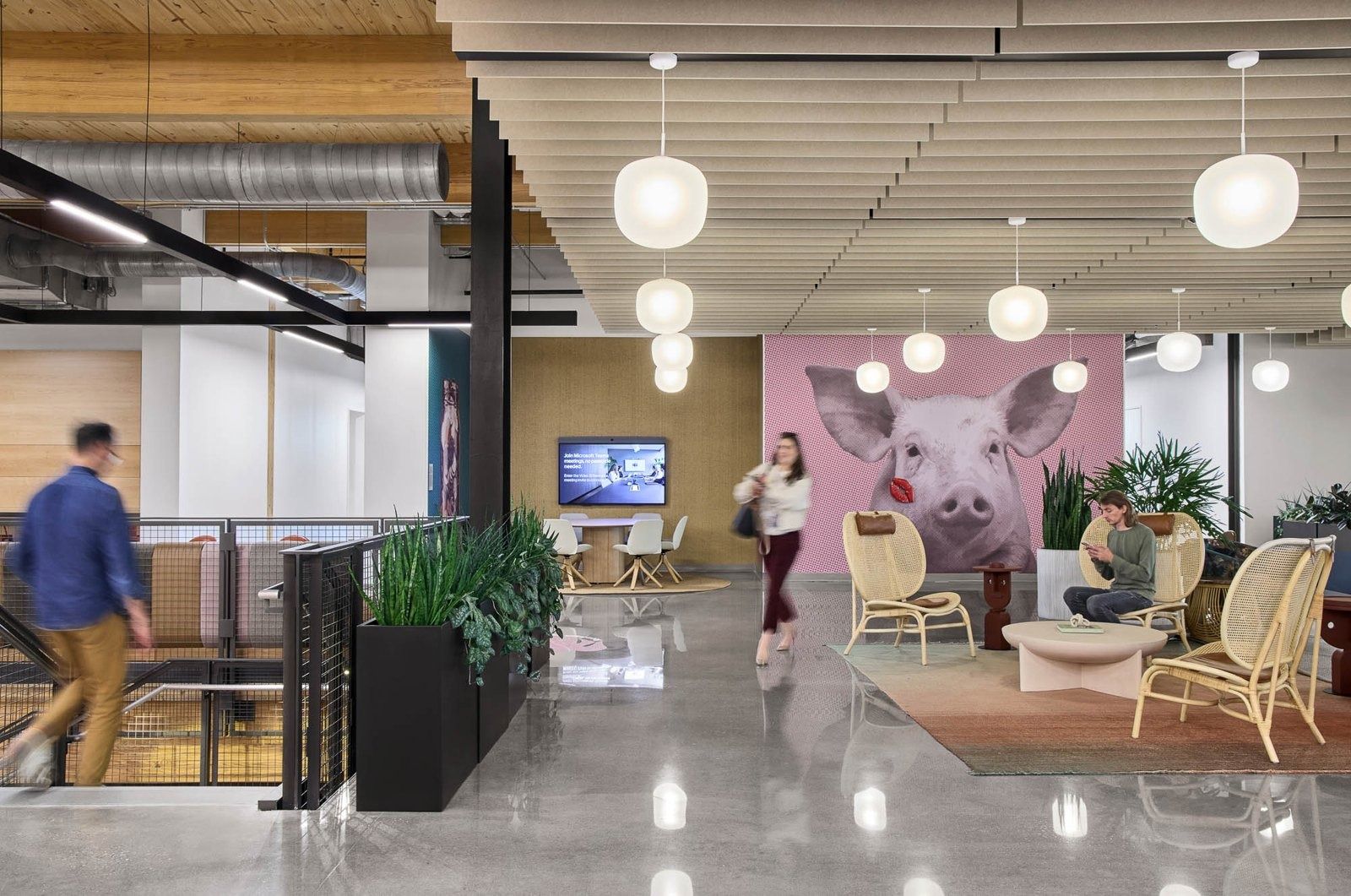 Walmart: A breakout space with a pink pig mural