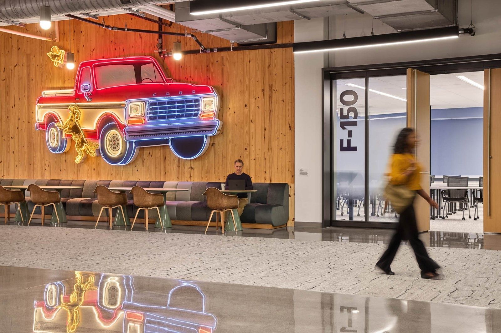 Walmart: A lounge with a neon red pickup truck sign