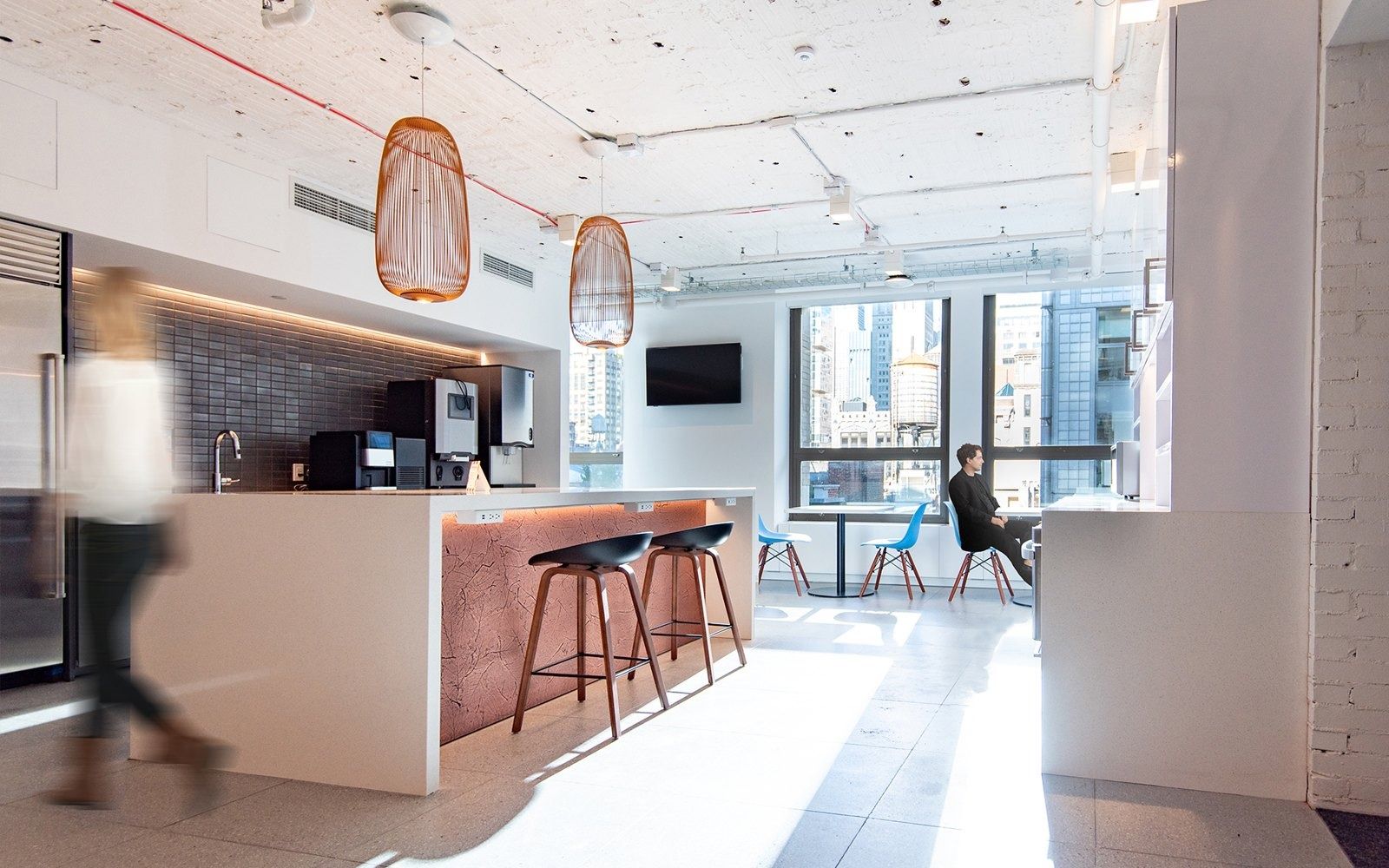 Warner Bros. Discovery: Pantry with a bar counter and woven pendant lamps