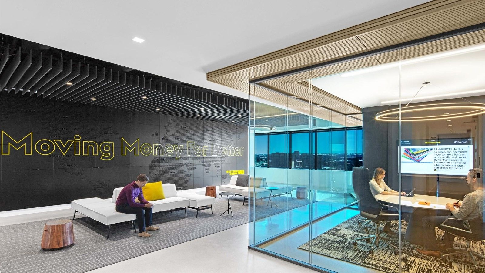 Western Union: A lounge beside glass meeting rooms