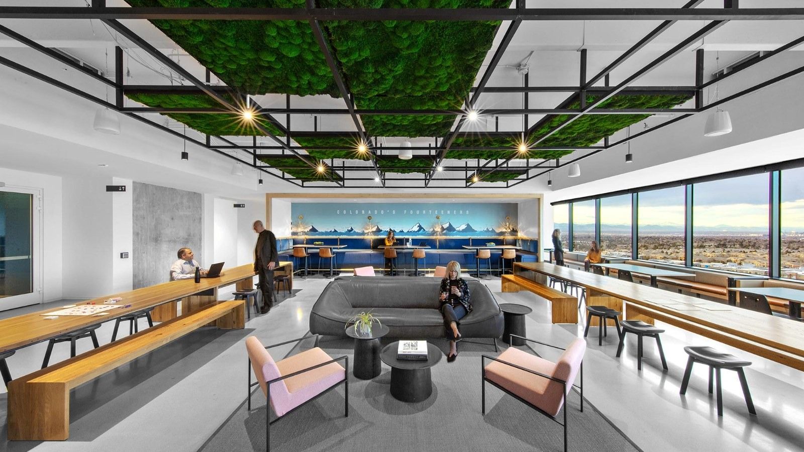Western Union: An open lounge with a green ceiling and city views