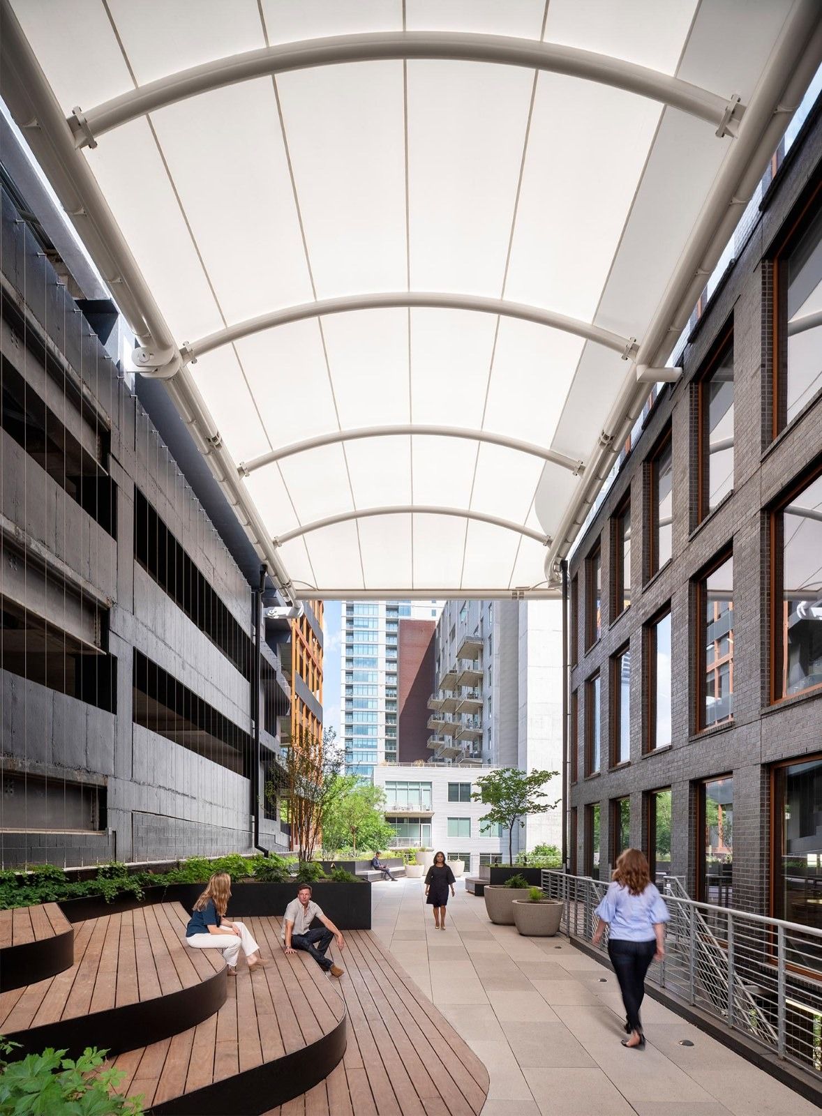 Whole Foods Market: A walkway under a translucent canopy between buildings
