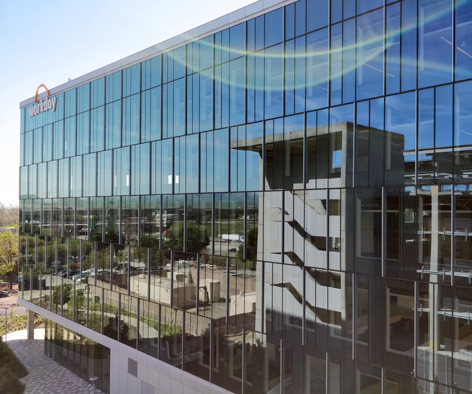 Workday: Glass facade reflecting the sky