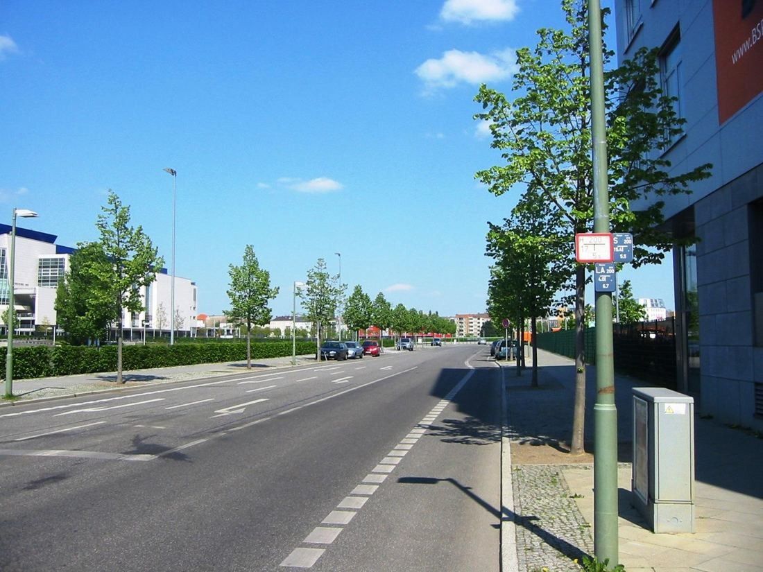 Tree-lined Tamara-Danz-Straße with new office buildings
