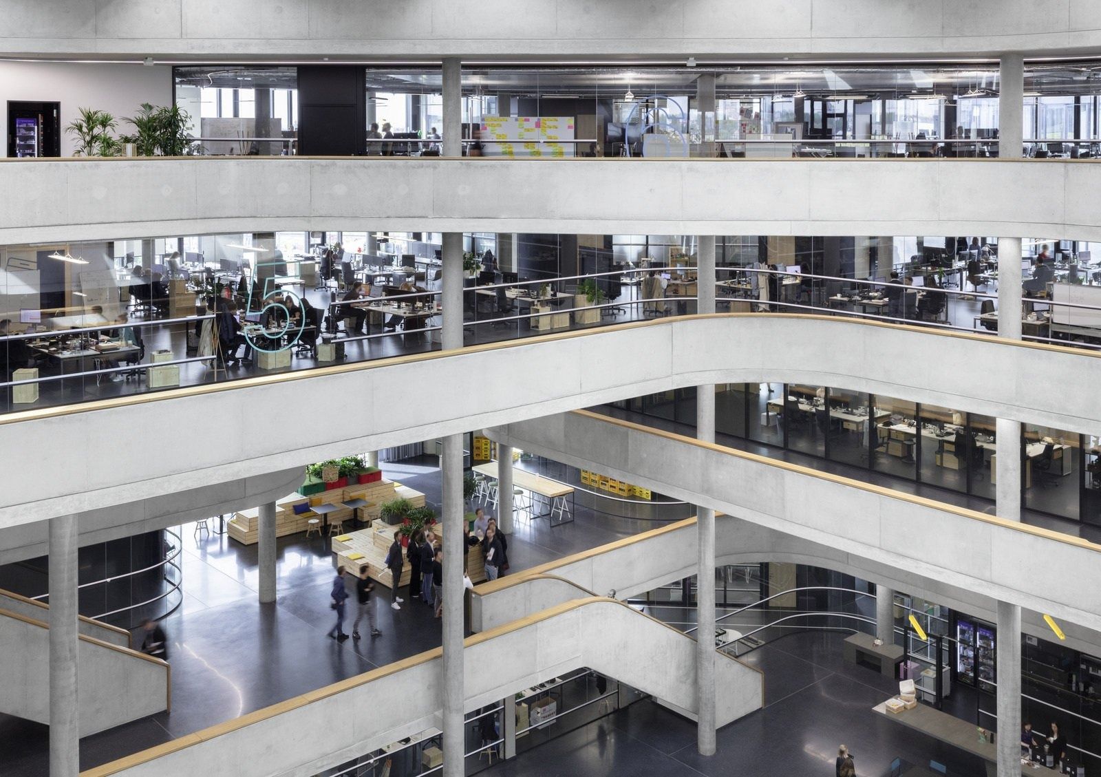 Zalando: Open office floors stacked around a light well with stairs