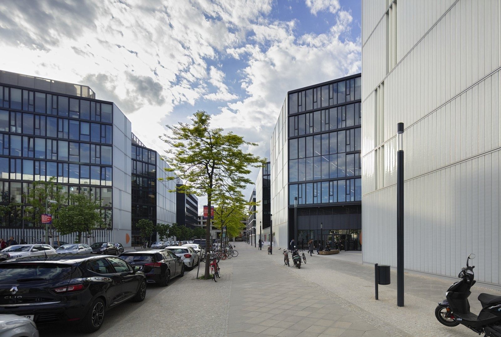 Zalando: Street between modern office buildings with parked cars
