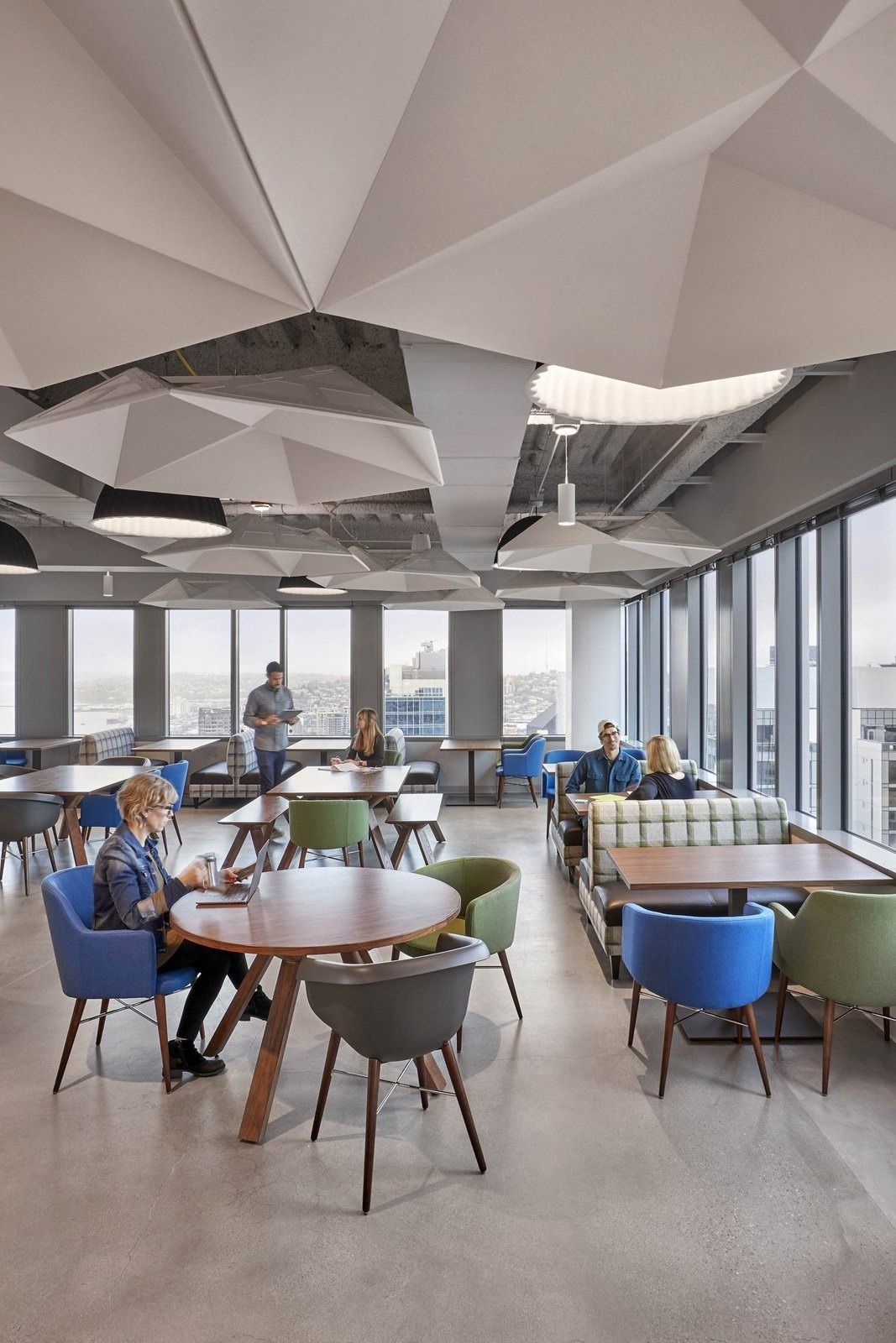 Zillow: Café floor under a folded white ceiling