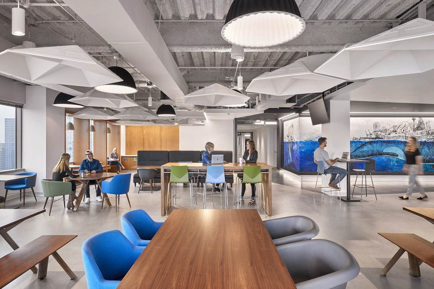 Zillow: Café with long tables and pendant lights