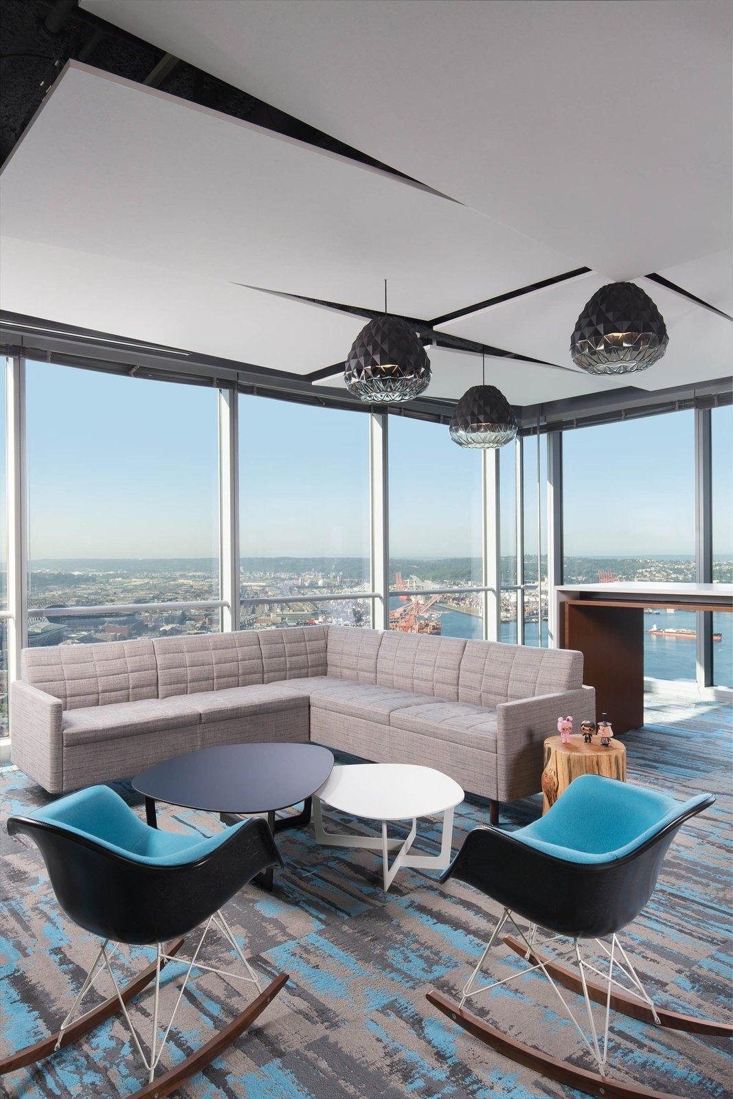 Zillow: Corner lounge with sofas and a wide view over Elliott Bay