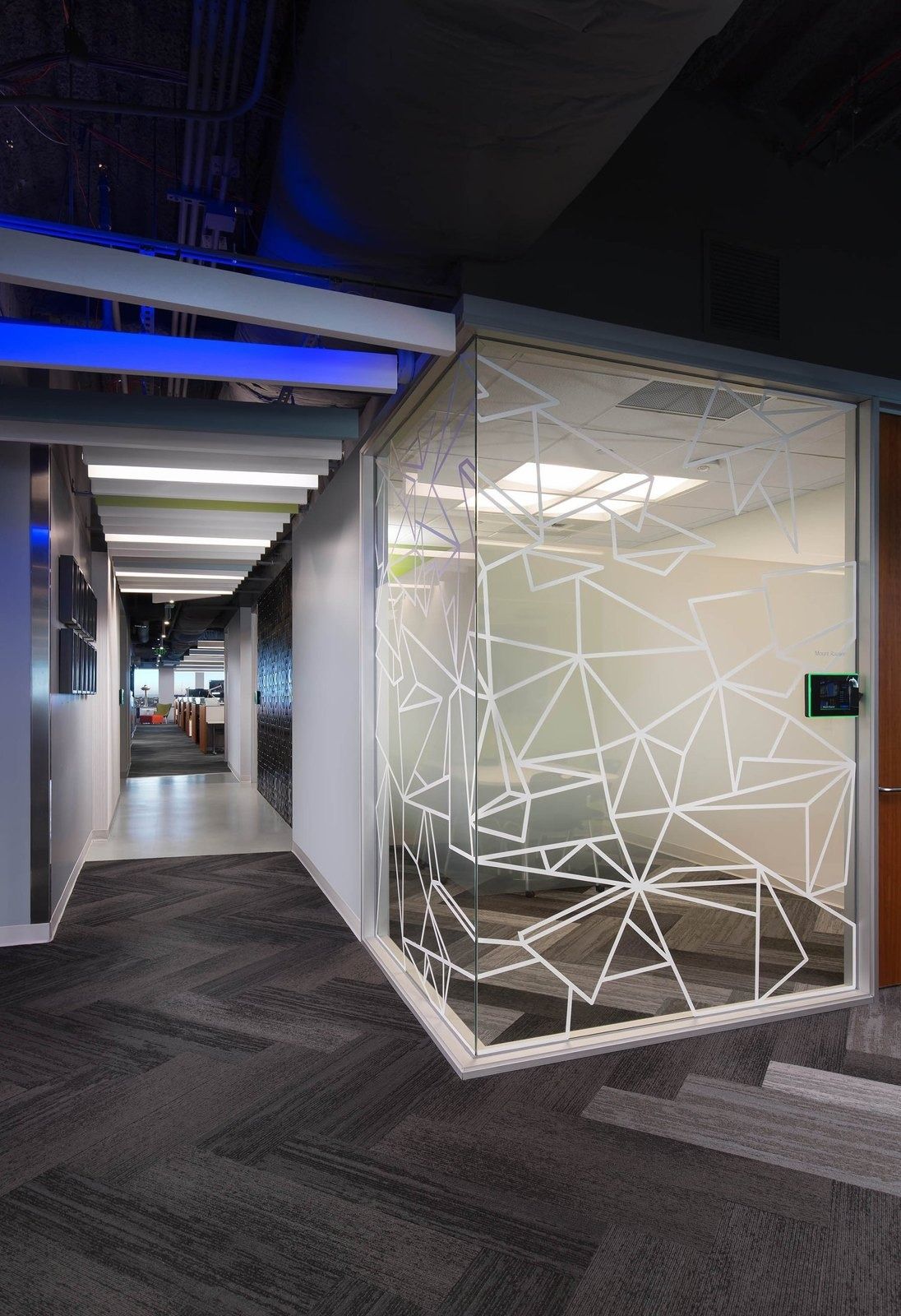 Zillow: Glass meeting room with a white line pattern