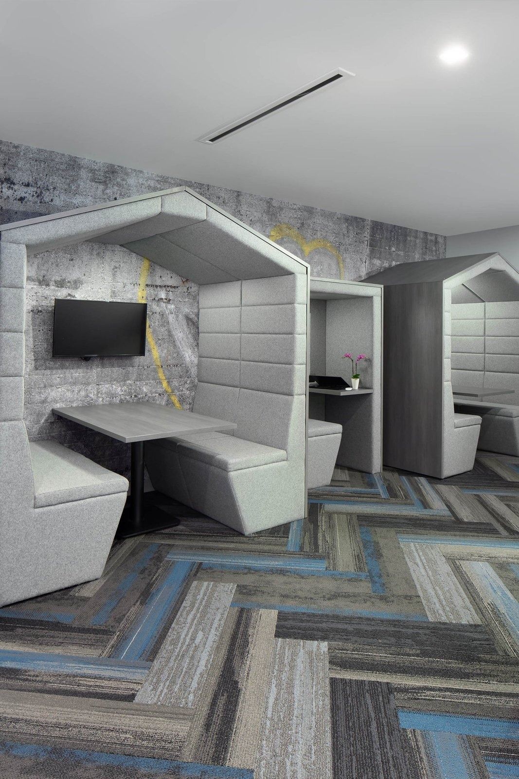 Zillow: Hooded booths on a patterned carpet
