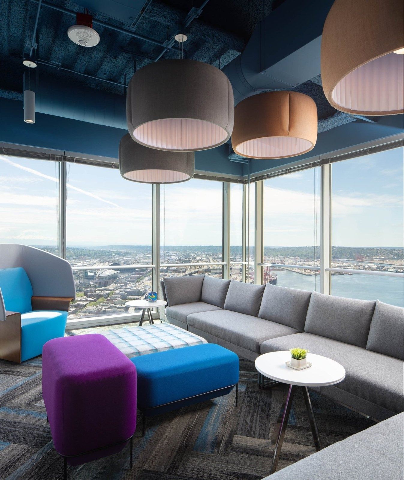 Zillow: Lounge seating by floor-to-ceiling windows
